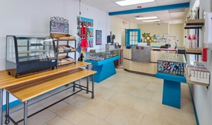 Spa and resort boutique with fresh baked pet treats, collars and grooming products